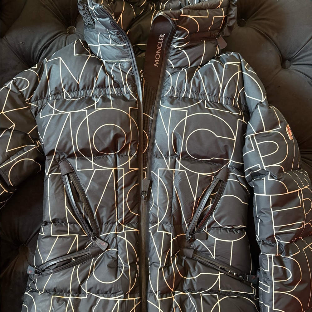 Moncler Women's Black and White Graphic Puffer Jacket. NEED’S DRY CLEANING ONLY